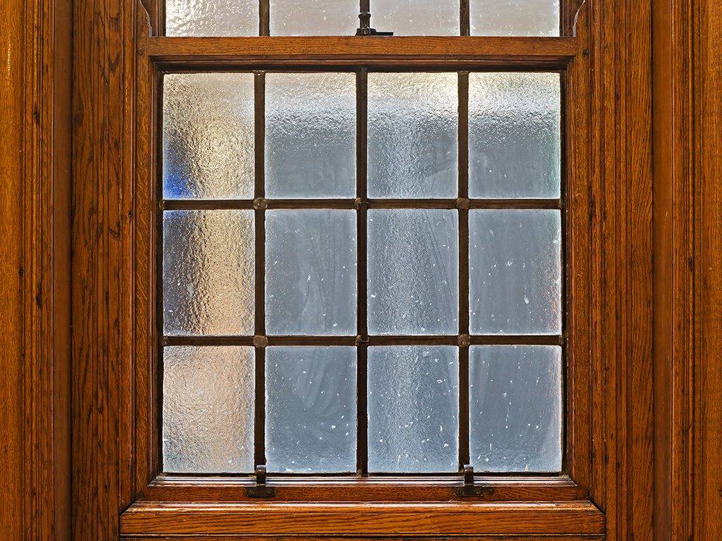 traditional window with large wooden window frame